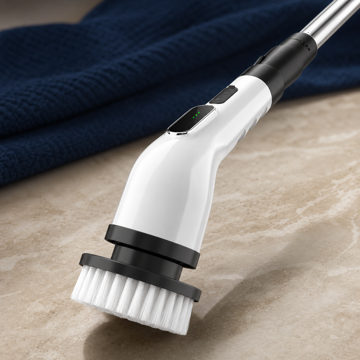 Close studio view of the white scrubber handle, extension tube and cleaning attachments